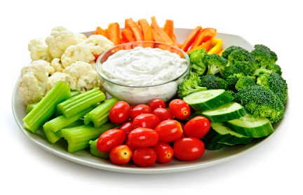 Platter of assorted fresh vegetables with dip